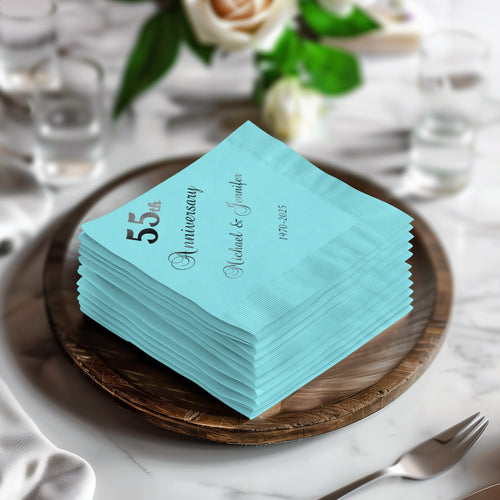Stack of teal napkins for 55th anniversary, Michael & Jennifer, 1971-2025.