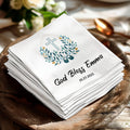 White personalized baptism napkins with "God Bless Emma" and date.