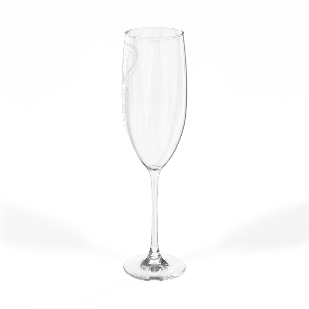 Clear champagne flute with etched heart design.